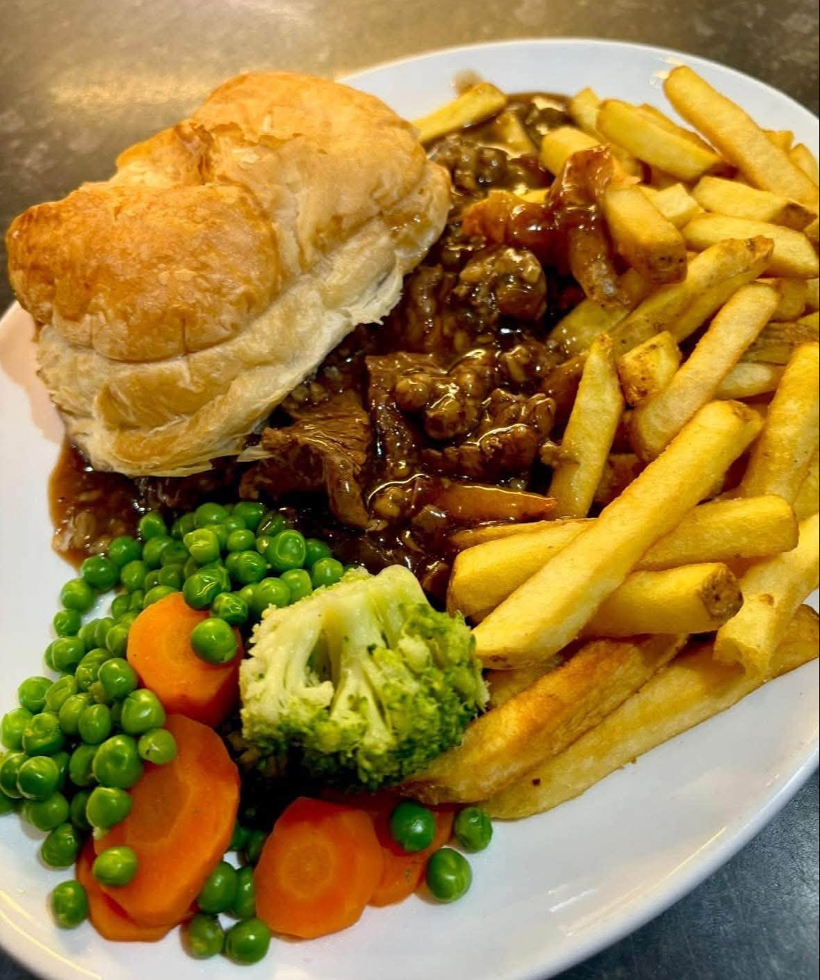 Steak pie and chips at Papa Jacques